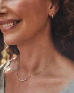 Mila 14k Yellow Gold Huggie Earrings In White Diamond -Jewelry Shop kendra scott mila huggie earrings 14k yellow gold white diamond