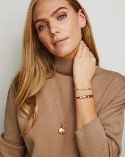 North Star Charm In Rose Gold -Jewelry Shop kendra scott north star charm rose gold white 03 lg